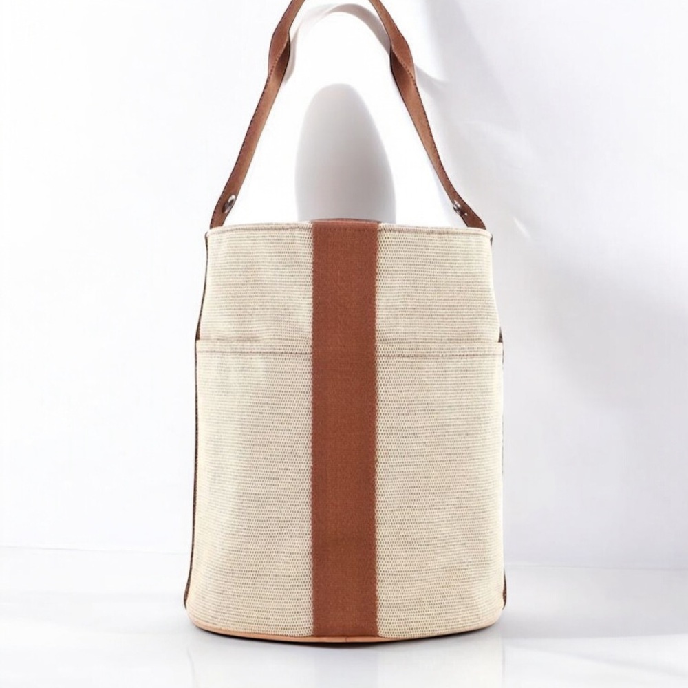 HERMES Saxo Toile H
Canvas Bucket Bag